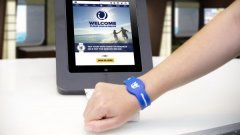 low 1408793468 wristband-in-use-final-composite